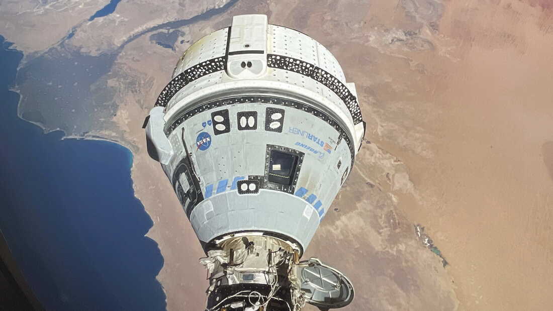 The Starliner spacecraft docked to the International Space Station and orbiting 262 miles above Egypt's Mediterranean coast, on June 13. NASA says additional testing is needed before Starliner can return to earth.