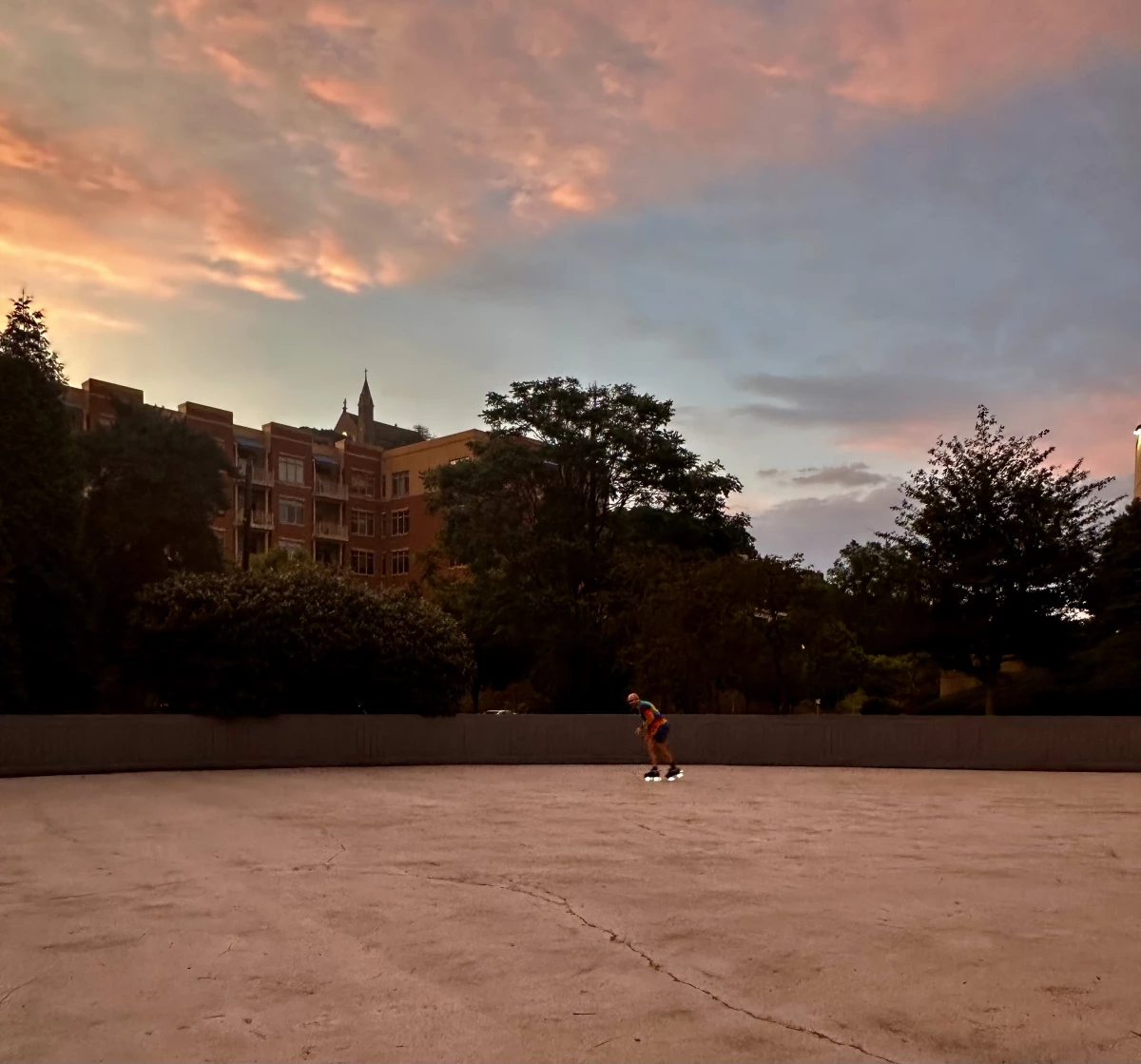 As the sun sets, Matt Helferich cruises around the rink with his light-up skates.
