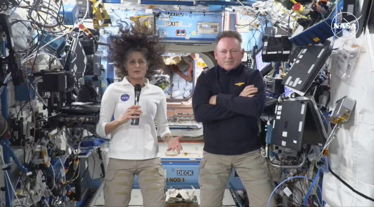 This image made from a NASA live stream shows NASA astronauts Suni Williams and Butch Wilmore during a press conference from the International Space Station on Friday.