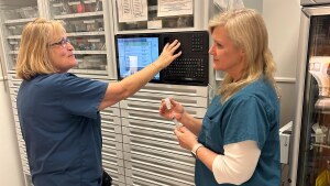 Nurses Brandy Frye (left) and Susan Fleishman work the night shift at Nanaimo Regional General Hospital in British Columbia. Both said they left their longtime U.S. jobs last year to get away from the policies and hateful rhetoric of President Donald Trump.