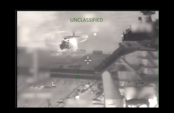 A U.S. helicopter lowers personnel onto the deck of the M/T Sophia, in a screenshot from a video published by U.S. Southern Command.