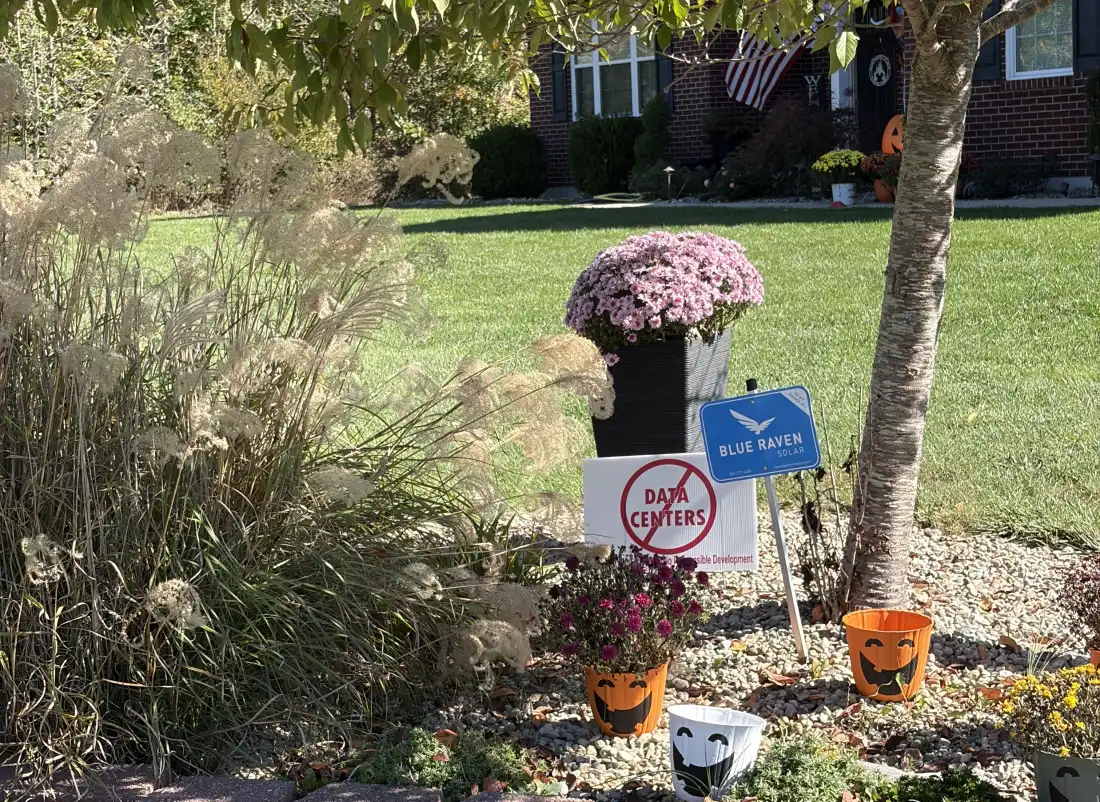 Signs opposing data centers outnumber campaign signs in a neighborhood in Mt. Orab, Ohio.