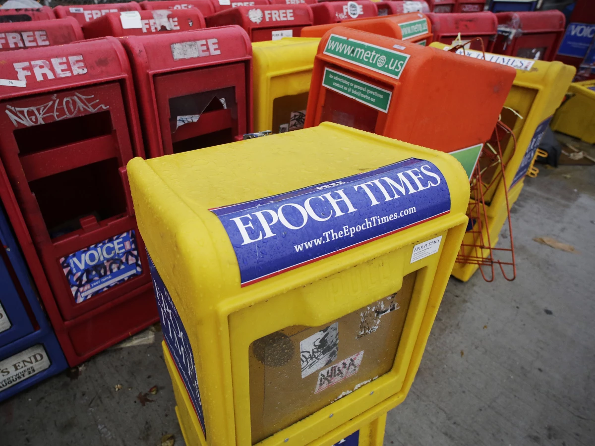 A 2013 file photo of an Epoch Times newspaper box in New York City. The outlet was founded by adherents to the Falun Gong spiritual movement but it has morphed into a pro-Trump conservative news organization in recent years. Earlier this month, the organization's chief financial officer was arrested on federal money laundering charges.