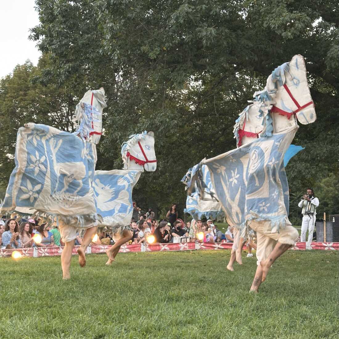 Puppeteers dressed as horses frolic during a performance of Our Domestic Resurrection Revolution In Progress! in Ypsilanti, Mich.