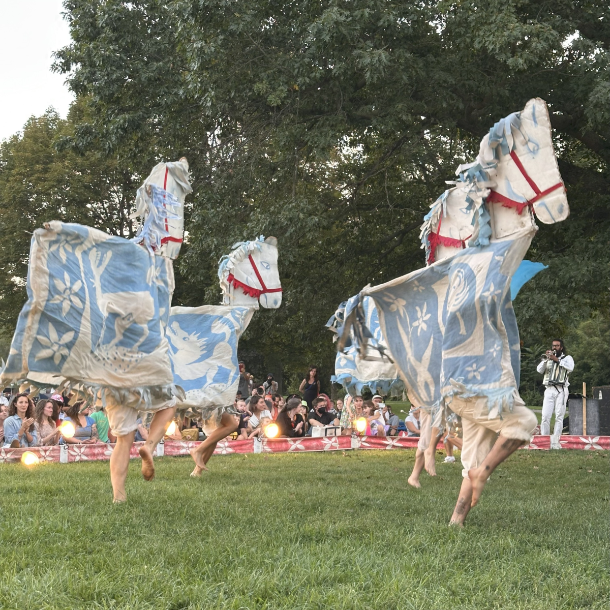Puppeteers dressed as horses frolic during a performance of Our Domestic Resurrection Revolution In Progress! in Ypsilanti, Mich.