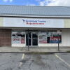 Campaign signs fill the windows of the Aroostook County Republican campaign headquarters in Caribou, Maine.