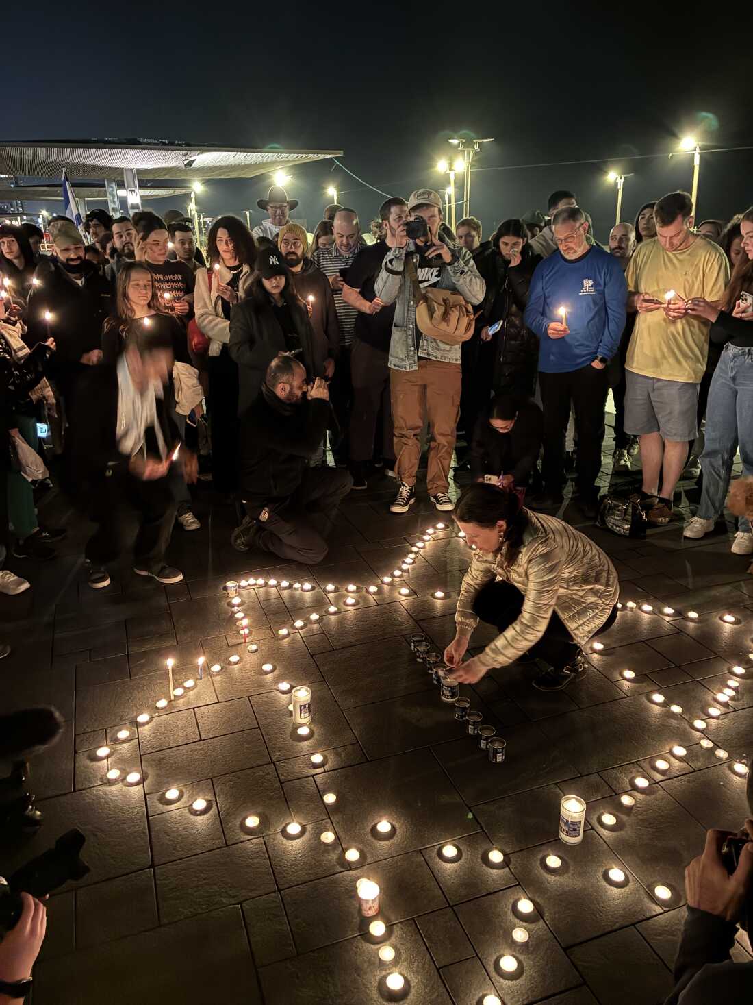 Australian Jews and others hold a vigil in Tel Aviv for the victims of the Bondi beach massacre, on Sunday, Dec 14.