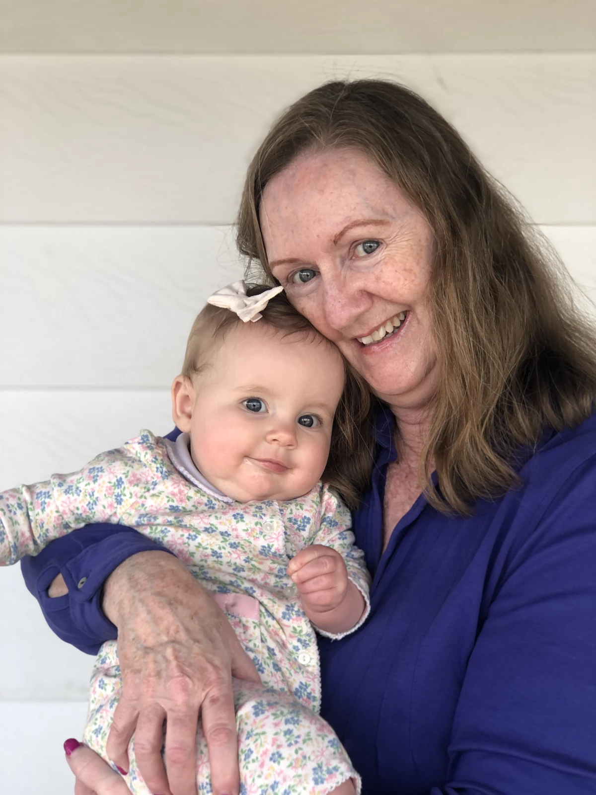 Erin Devine holds her granddaughter, Eleanor Marigold.