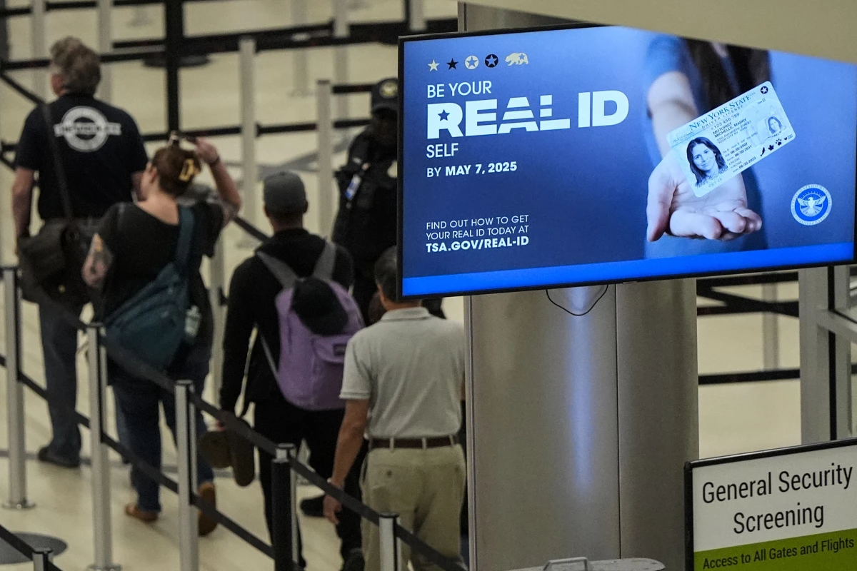Travelers move through Hartsfield-Jackson Atlanta International Airport ahead of Memorial Day, May 24, 2024, in Atlanta.