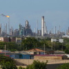 FILE - Flames rise from flare stacks at the Amuay refinery in Los Taques, Venezuela, Jan. 14, 2026.