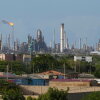 FILE - Flames rise from flare stacks at the Amuay refinery in Los Taques, Venezuela, Jan. 14, 2026.