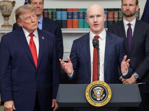 Brian Armstrong, the CEO of major crypto company Coinbase, speaks as President Trump looks on during a summit of crypto and technology leaders at the White House in Washington, D.C., on Aug. 19, 2026.