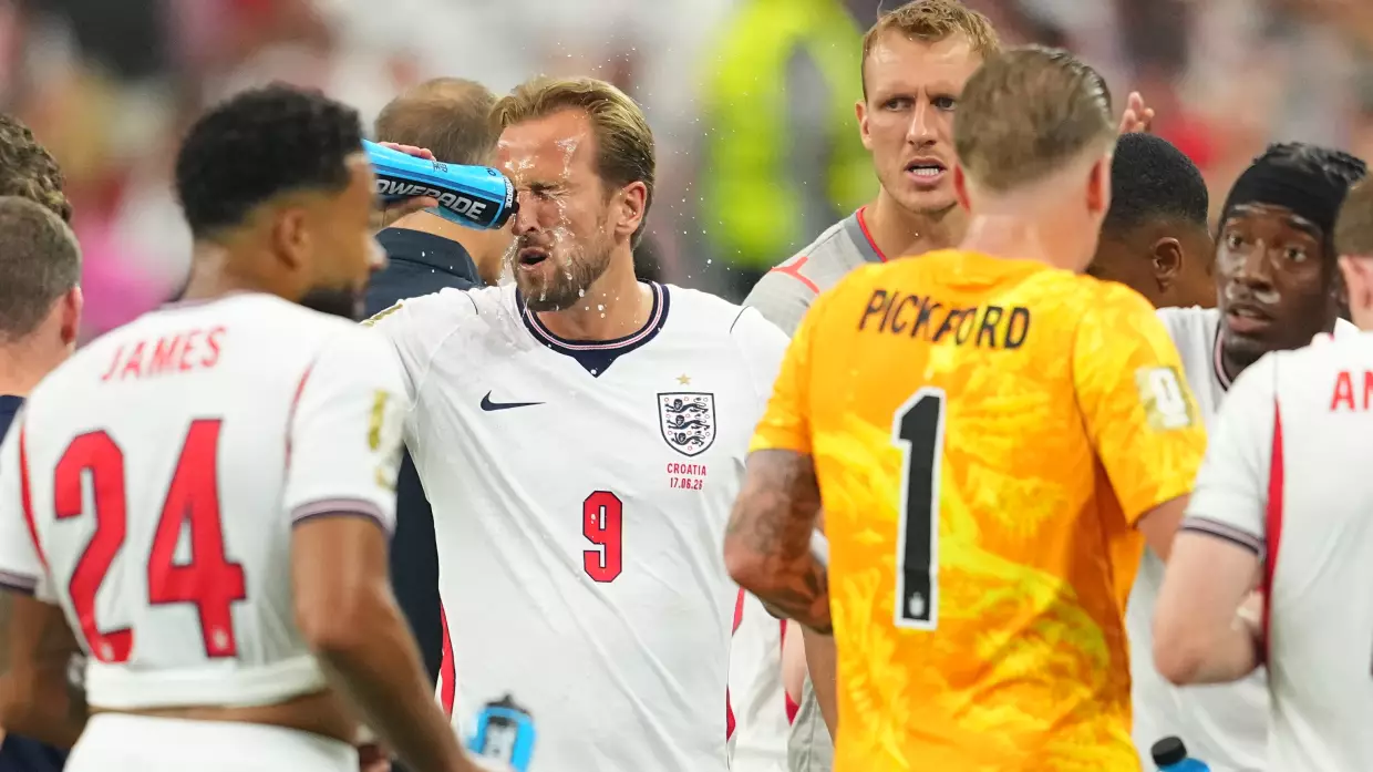 England's Harry Kane (9) cools off during a hydration break of the World Cup Group L soccer match between England and Croatia in Arlington, Texas, near Dallas, Wednesday, June 17, 2026.