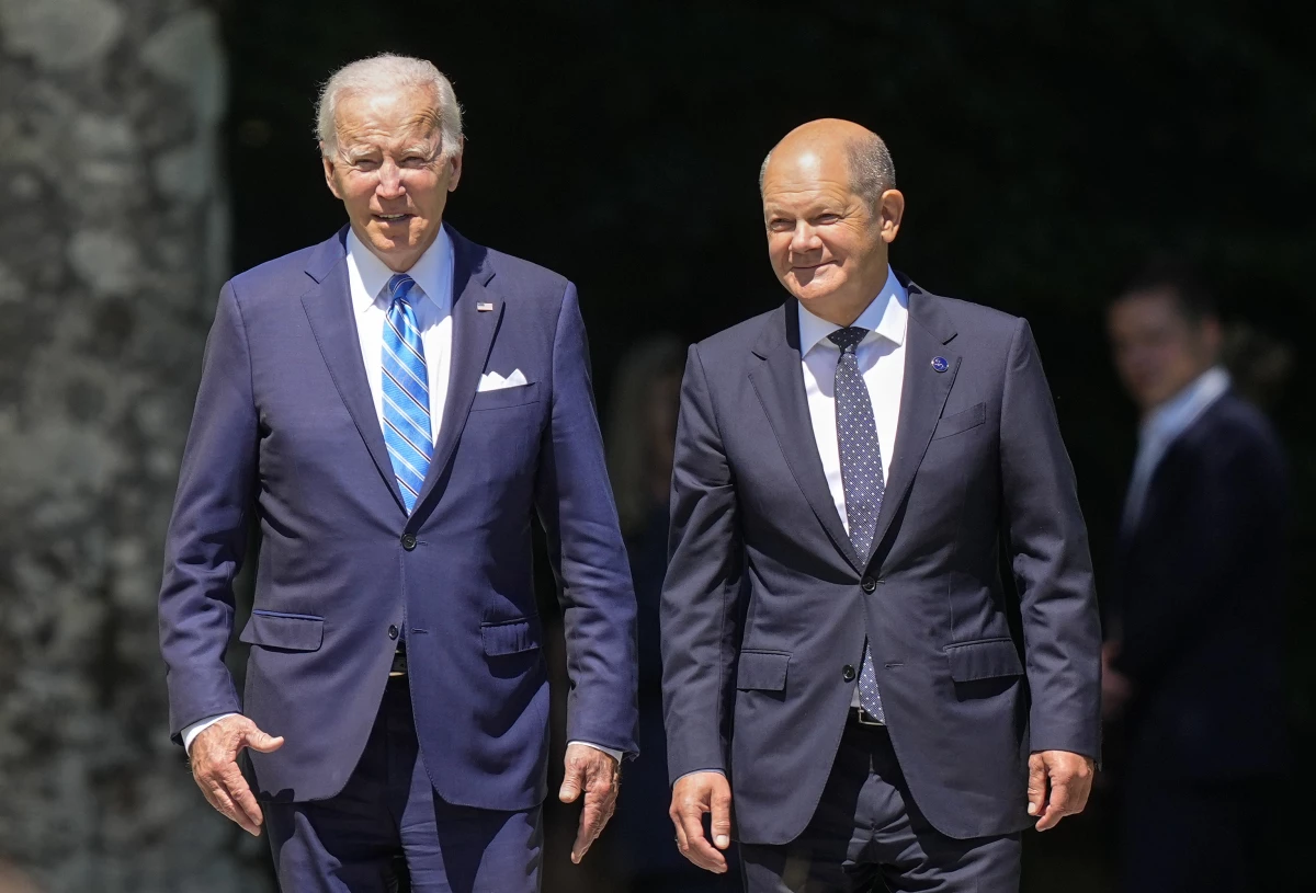 President Biden and German Chancellor Olaf Scholz (right) arrive for the official Group of Seven summit welcome ceremony at Castle Elmau in Krün, Germany, on June 26, 2022.