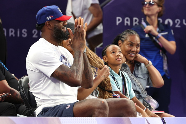 LeBron James cheers on fellow Team USA basketballers in the 3x3 women's game against Spain last week at Esplanade Des Invalides during the Paris Games.