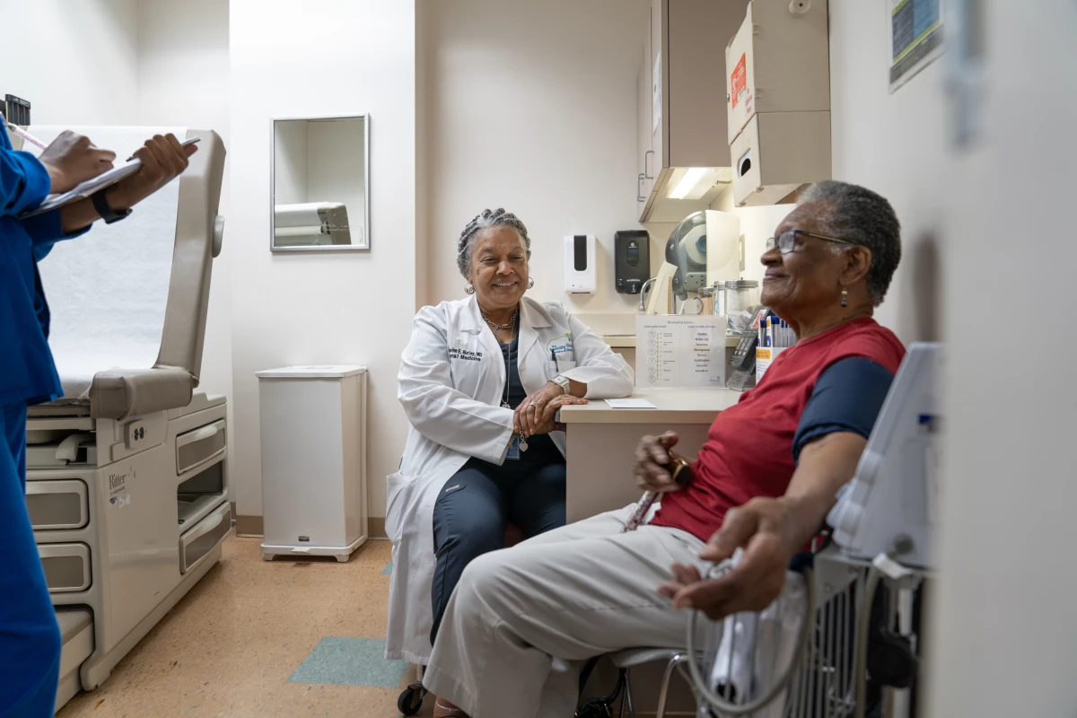 Dr Catherine E Burley sees patient Dorothy Wright at The Family Health Center at West End in Atlanta.