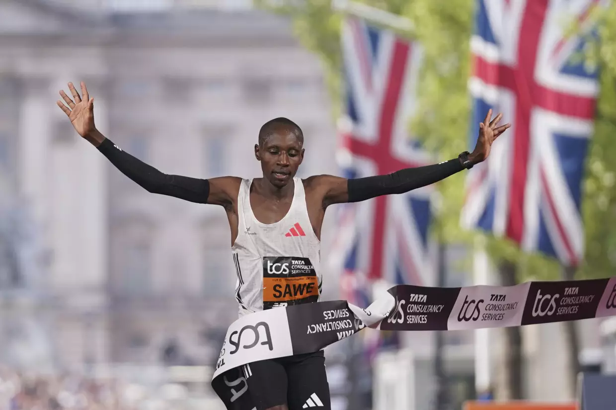 Sabastian Sawe of Kenya crosses the line to win the men's race at the London Marathon, April 27, 2025