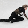 Ilia Malinin of the United States falls during the men's free skate program in figure skating at the 2026 Winter Olympics, in Milan, Italy, Friday, Feb. 13, 2026.
