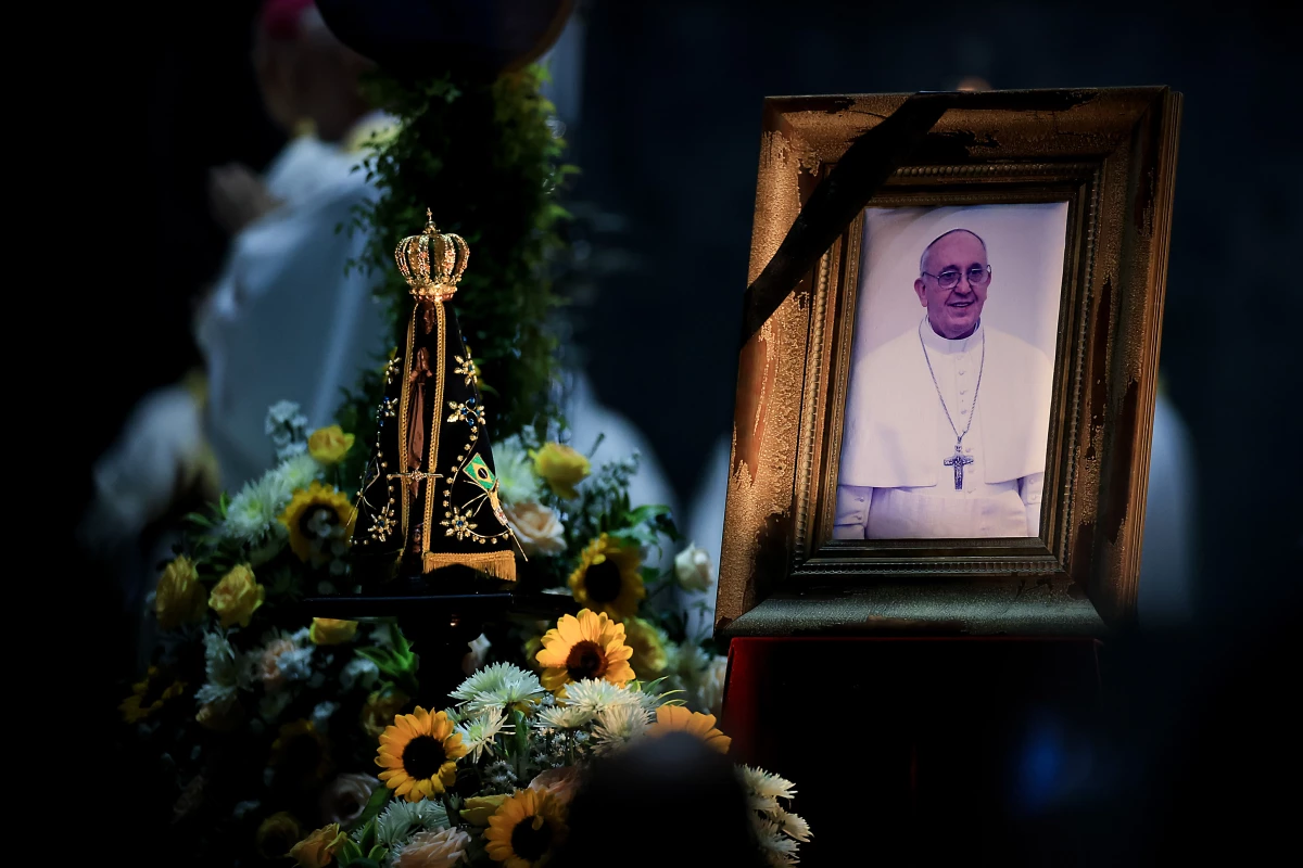 A portrait of the late Pope Francis is displayed during a mass in his honor at the Rio de Janeiro Metropolitan Cathedral Monday in Rio de Janeiro, Brazil.
