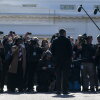 Then-CNN White House correspondent Jim Acosta talks with reporters as he returns to the White House after his press pass was restored on Nov. 16, 2018, in Washington.