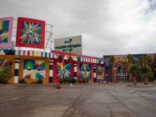 The Prizm Outlets, formerly known as the Fashion Outlets of Las Vegas, featured stores like Coach and Michael Kors. Now artists have used it as a canvas for murals.