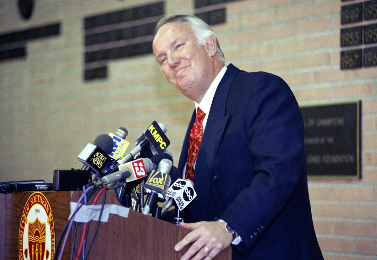 Former head coach of the Los Angeles Rams John Robinson addresses the media in Los Angeles, Jan. 3, 1992.