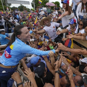 Opposition leader Maria Corina Machado greets supporters during a campaign rally for presidential candidate Edmundo Gonzalez, in Maturin, Venezuela, on July 20, 2024.