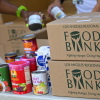 The Los Angeles Regional Food Bank provided boxes of groceries for a food giveaway in August. Food insecurity is expected to increase as government assistance programs are scaled back.
