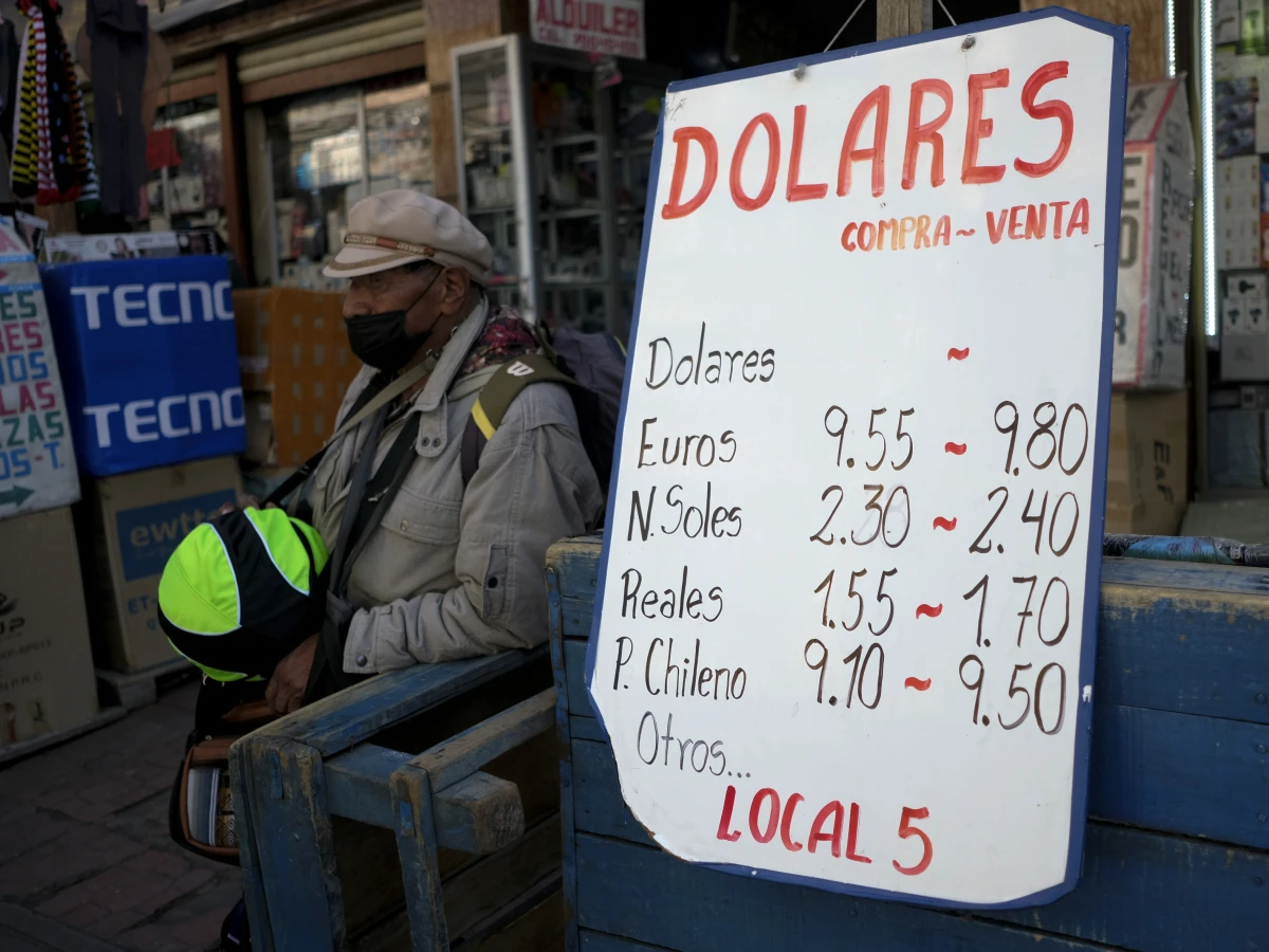 A sign displays currency exchange rates in La Paz on Friday, June 28, 2024.