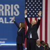 Takeaways from Tim Walz's introduction to the national stage 4 Vice President Harris, the Democratic presidential nominee, and her running mate, Minnesota Gov. Tim Walz, arrive for a campaign rally in Philadelphia Tuesday.