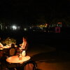 Diners sit at an outdoor restaurant in Sevastopol, Crimea on July 22. Ukrainian drone strikes are causing power outages, fuel shortages and cuts in cellphone service in the peninsula. Russia seized Crimea when it first invaded Ukraine in 2014, but now its hold on the territory is being challenged.