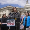 Then-Sen. Kamala Harris, D-Calif., joins a 2018 U.S. Capitol protest against threats by then-President Donald Trump against Central American asylum-seekers to separate children from their parents along the southwest border to deter migrants from crossing into the United States.