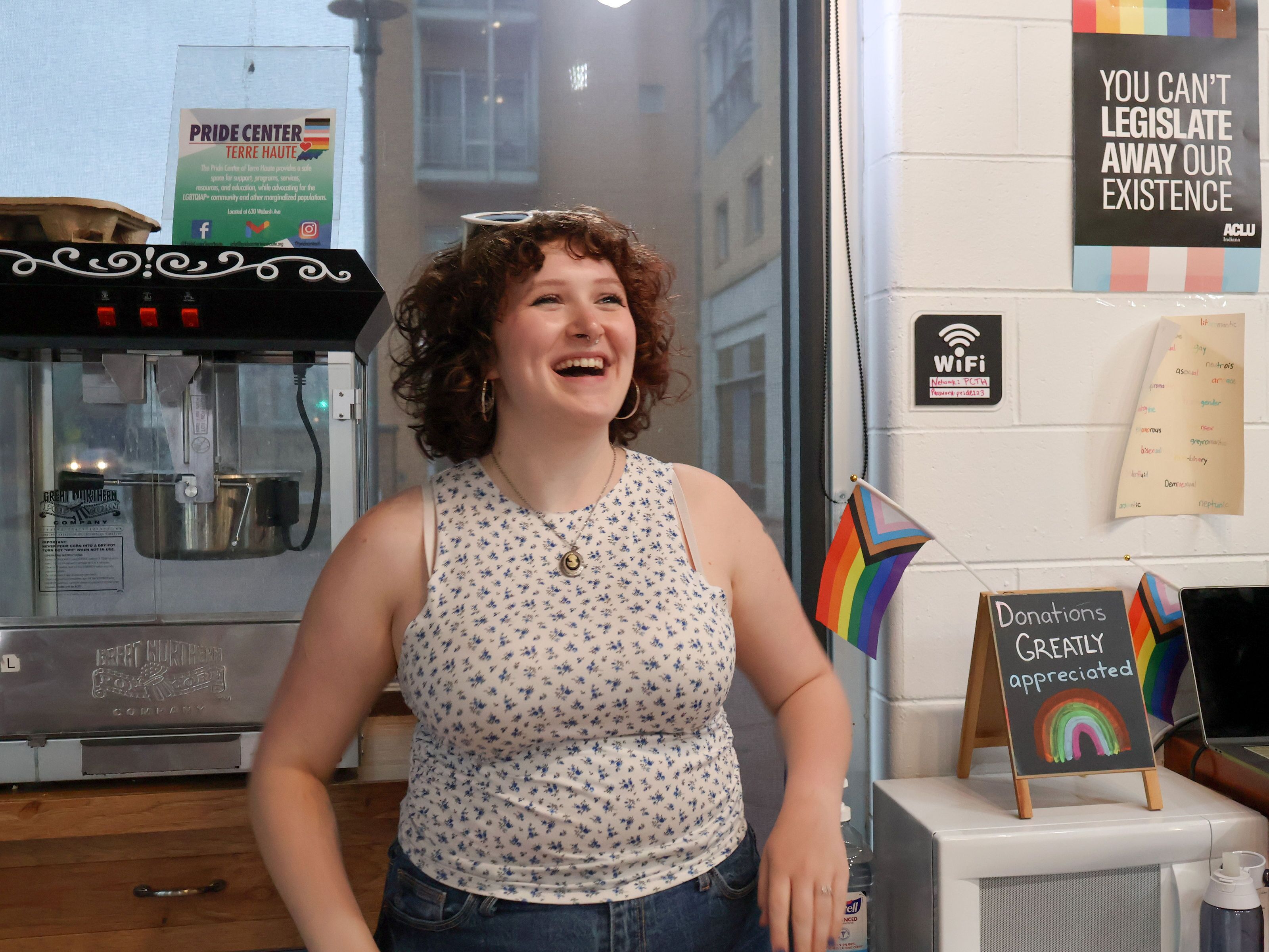 Alora Hodgins smiles during a karaoke night at the Pride Center of Terre Haute.