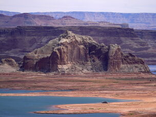 Low water levels at Wahweap Bay at Lake Powell along the Upper Colorado River Basin are pictured, June 9, 2021, at the Utah and Arizona border at Wahweap, Ariz.