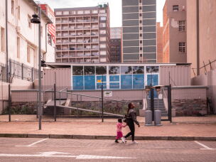 People walk past the closed WITS RHI Women's Health Clinic in Esselen street, Hillbrow, Johannesburg, South Africa on May 25, 2026.