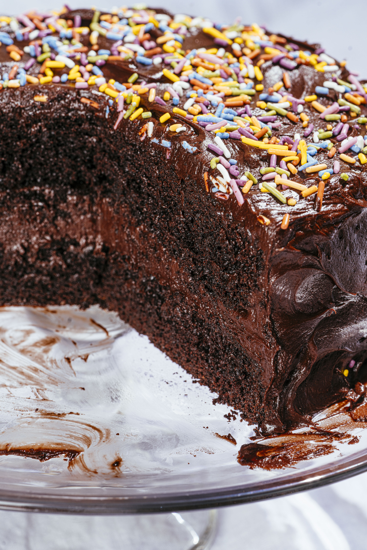 'I find it to be such a cool experience for a kid to see they can make something so magnificent from scratch,' Nayfeld says about making this chocolate cake with chocolate buttercream frosting with his daughter.