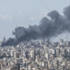 Smoke rises over Lebanon's capital of Beirut following Israeli airstrikes on Wednesday. Israel said it was targeting Iran-backed Hezbollah, despite a U.S. ceasefire with Iran.