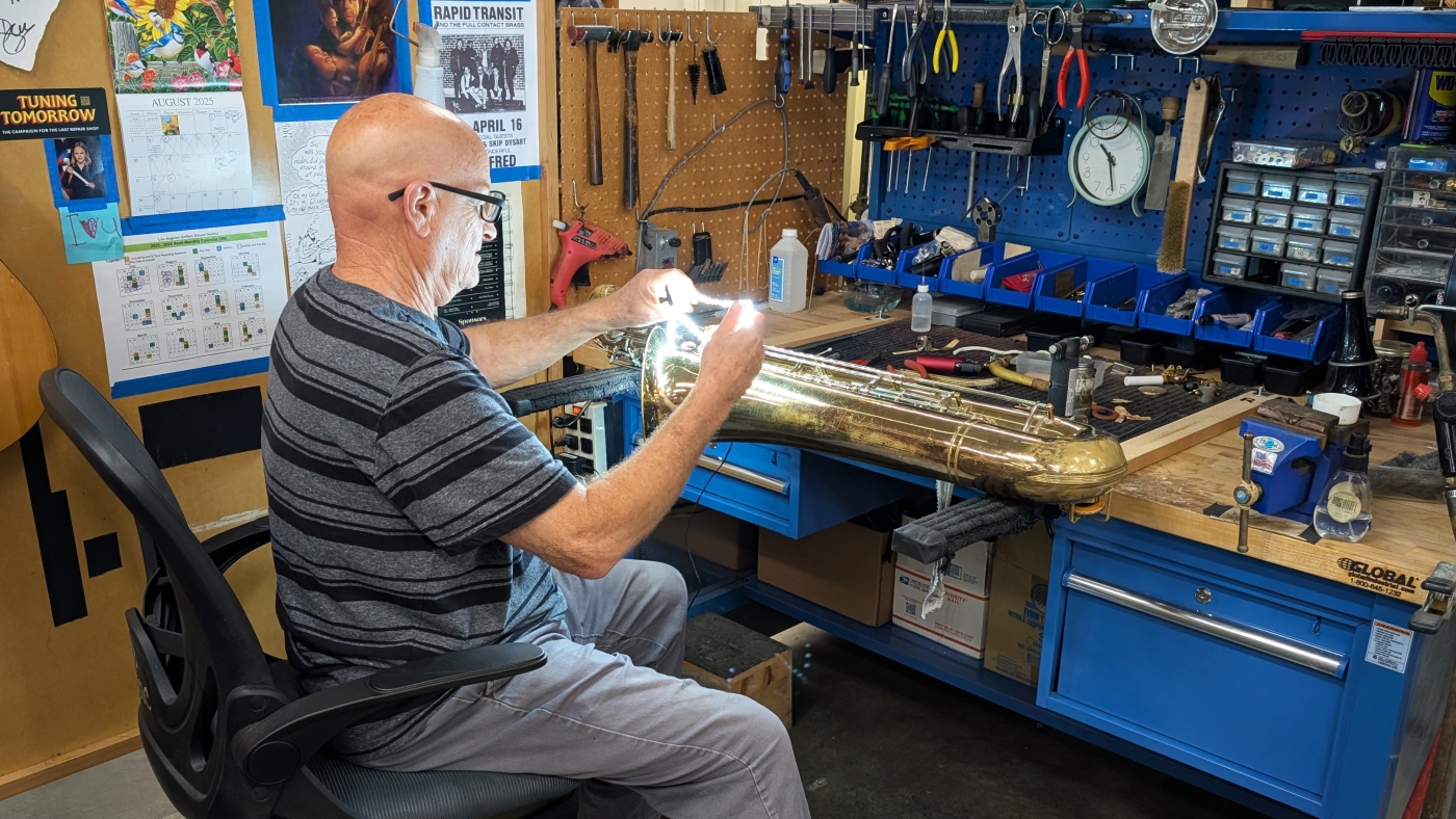 This shop fixes student instruments for free. Now, a music legend is chipping in