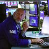A trader works on the floor of the New York Stock Exchange.
