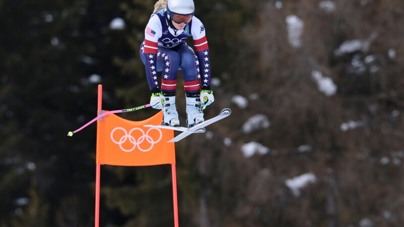 United States' Lindsey Vonn speeds down the course during an alpine ski, women's downhill official training, at the 2026 Winter Olympics, in Cortina d'Ampezzo, Italy, Friday, Feb. 6, 2026. (AP Photo/Marco Trovati)