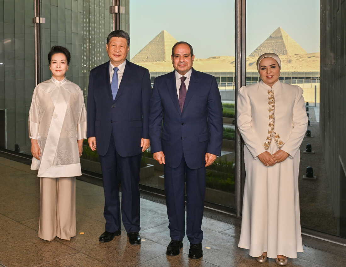 In this photo released by Xinhua News Agency, Chinese President Xi Jinping, second left, and his wife Peng Liyuan, left, pose with Egyptian President Abdel-Fattah el-Sissi and first lady Entissar el-Sissi as they visit the Grand Egyptian Museum in Giza, Egypt on Wednesday, Sept. 2, 2026.
