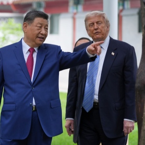 FILE - President Donald Trump talks with China's President Xi Jinping at the Zhongnanhai leadership compound, May 15, 2026, in Beijing.