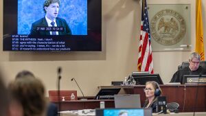 A recording of Meta Founder and CEO Mark Zuckerberg's deposition is played for the jurors on March 4 in Santa Fe, N.M.