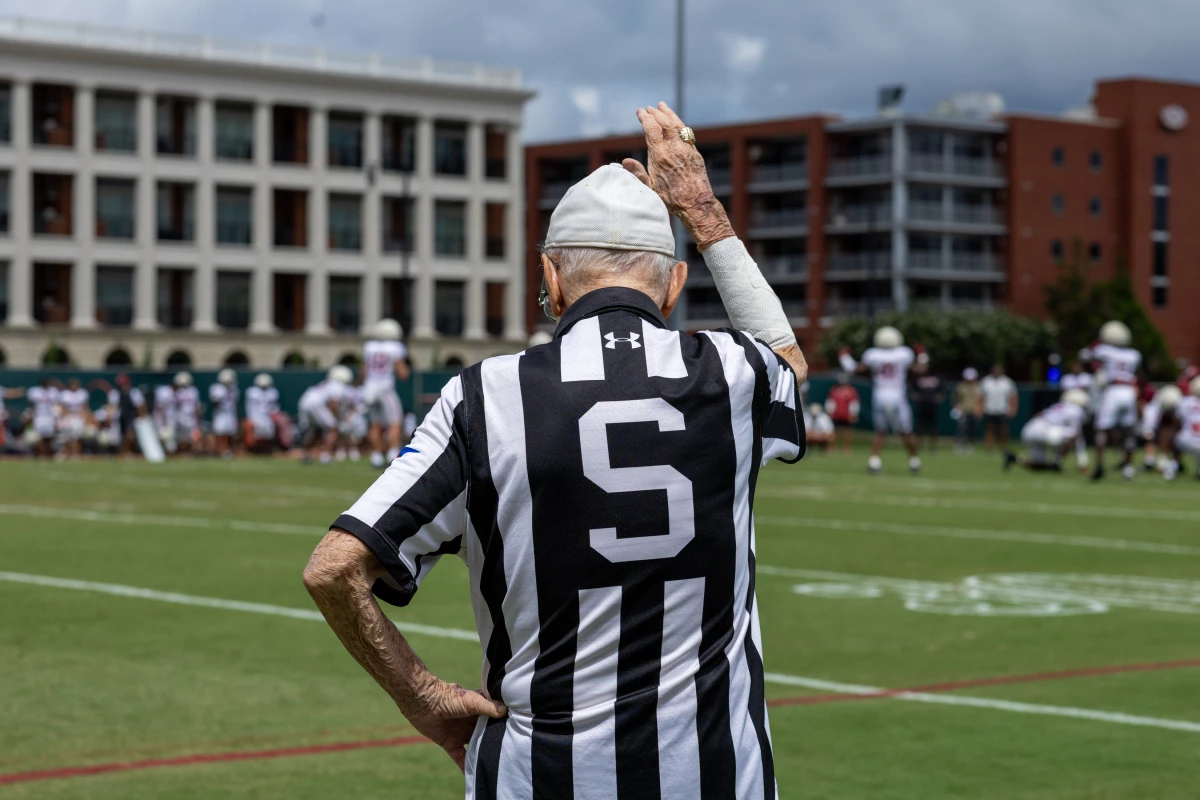 Eddie Conyers got his start as a practice referee at the University of Alabama when legendary coach Paul 'Bear' Bryant asked him to officiate in the 1960s. While he's no longer whistling fouls and throwing flags, he still attends practices to mentor other officials.