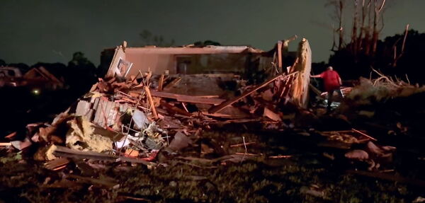 Storm damage is surveyed in Laurel County, Ky., after tornadoes brought destruction to the region Friday night.