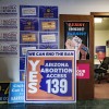 Sign in favor of proposition 139, the right to abortion initiative, are displayed at the entrance room of the Tucson HQ of Arizona List, an association made to empower and elect progressive pro-choice Democratic women leaders, in Tucson, Arizona, October 16, 2024.