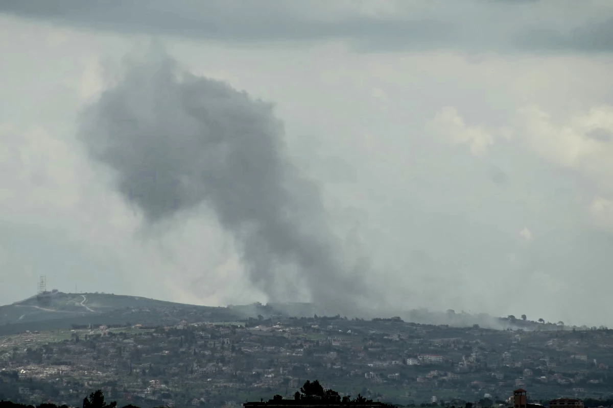 Smoke rises from the site of an Israeli airstrike that targeted the outskirts of the southern Lebanese village of al-Taybeh, on April 10, 2026. Pakistan was poised on April 10, 2026, to host Iranian and US delegations for negotiations in its capital, although Tehran's participation remained uncertain after deadly Israeli strikes on Lebanon threatened this week's temporary truce.