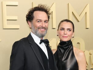 Actors Matthew Rhys and Keri Russell attend the Emmy Awards.