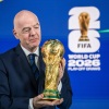 FIFA President Gianni Infantino poses with the World Cup trophy following the 2026 FIFA World Cup European Play-Off draw at the FIFA's Home of Football in Zurich on Nov. 20, 2025.