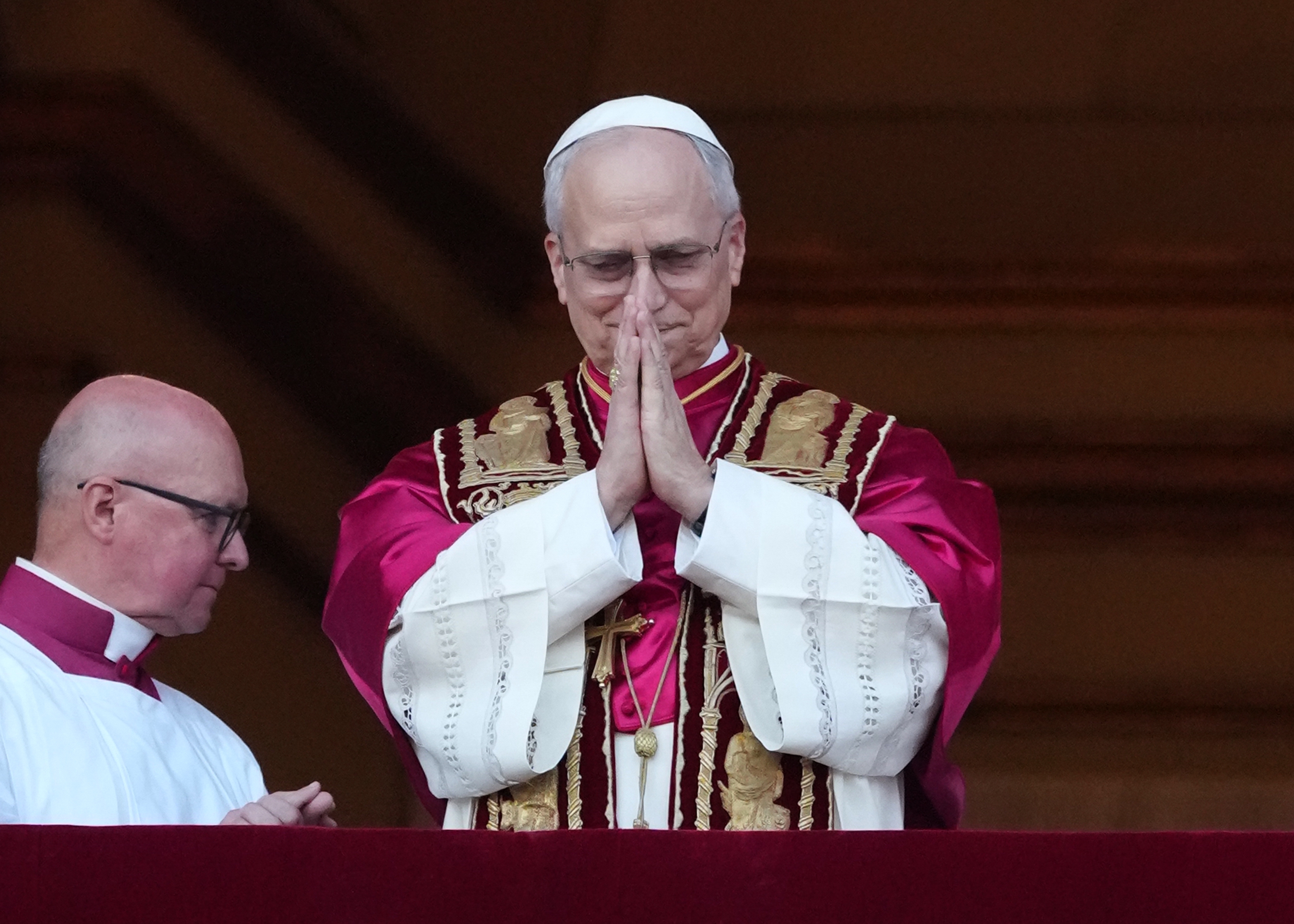 The newly elected Pontiff, Pope Leo XIV is seen for the first time from the Vatican balcony on May 8 in Vatican City, Vatican.